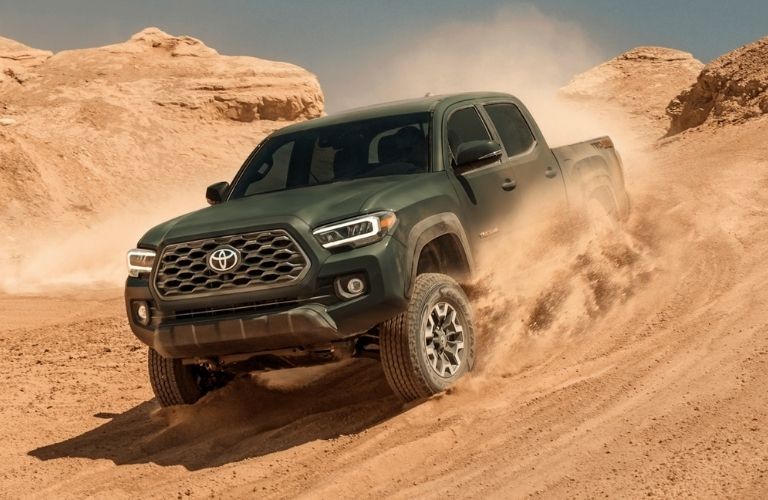 Toyota Tacoma on a sandy terrain