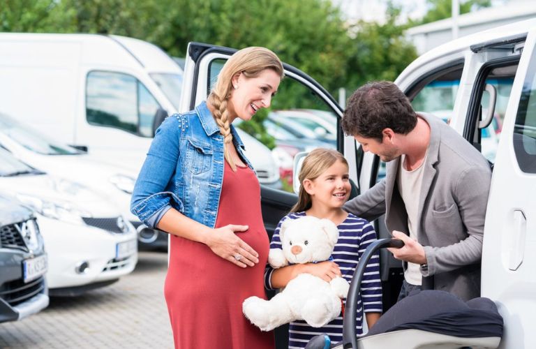Family purchasing a vehicle