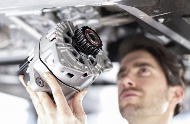 Service professional working on a vehicle