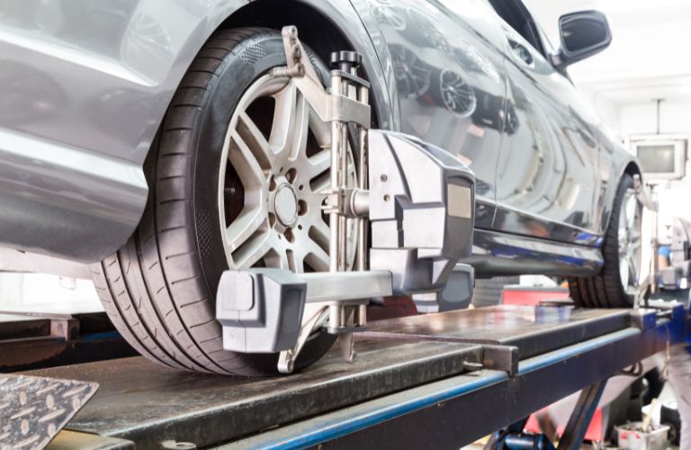 A car in a garage is shown.