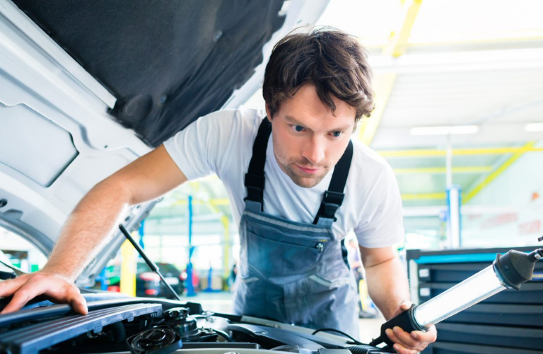 Mechanic checking a vehicle 