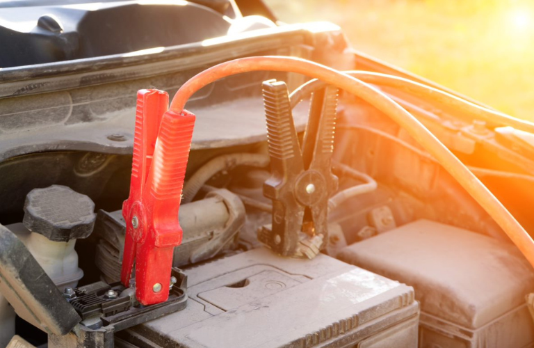 Mechanic checking the battery of a vehicle 